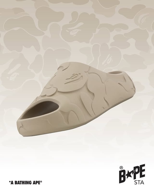 BAPE® SLIDE: CAMO ComfortA new essential arrives. BAPE® expands its footwear lineup with the debut of the BAPE® SLIDE, redefines everyday ease, merging a streamlined silhouette with the bold identity of signature SOLID CAMO. Lightweight, versatile, and built for movement.Available starting May 30, 2026, at BAPE STORE® and US.BAPE.COM. #ABATHINGAPE #BAPE #BAPESLIDE by @bape_us