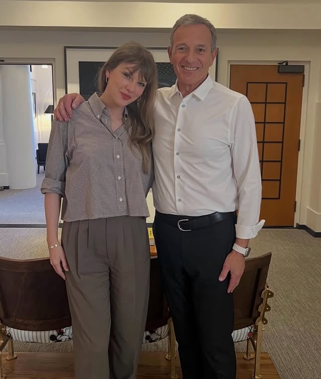 Taylor Swift with former Disney CEO @robertiger by @taylorswift.updates13