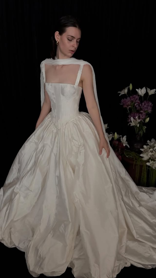NEW ARRIVAL: The Asymmetrical Cape by @flourestudio.A study in movement and modern romance. Light, directional, and designed to transform the silhouette with a single gesture.Now showing at LOHO alongside a curated edit of modern bridal designers. Discover the pieces that speak to your point of view.Appointments now open via the link in our bio. by @loho_bride
