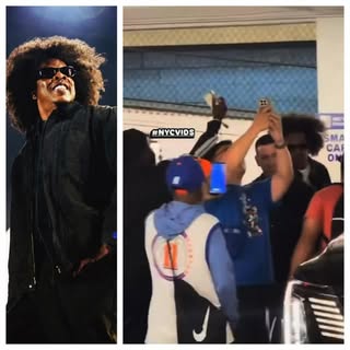 a group of fans forming around Jay-Z trying to get a picture after the game! by @saycheesedigital